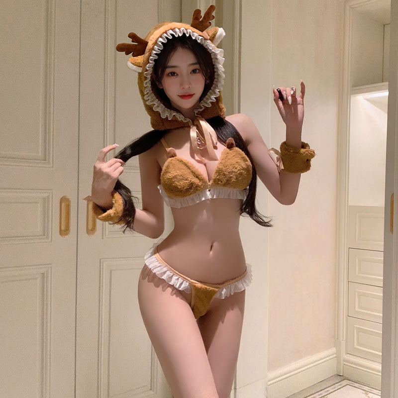 Model wearing elk in seductive or playful scene – Velalace