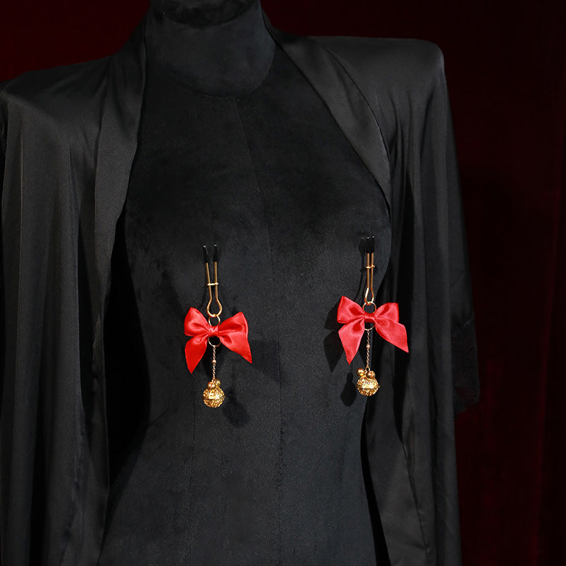 Model wearing red bell nipple clamps with adjustable pressure – Velalace