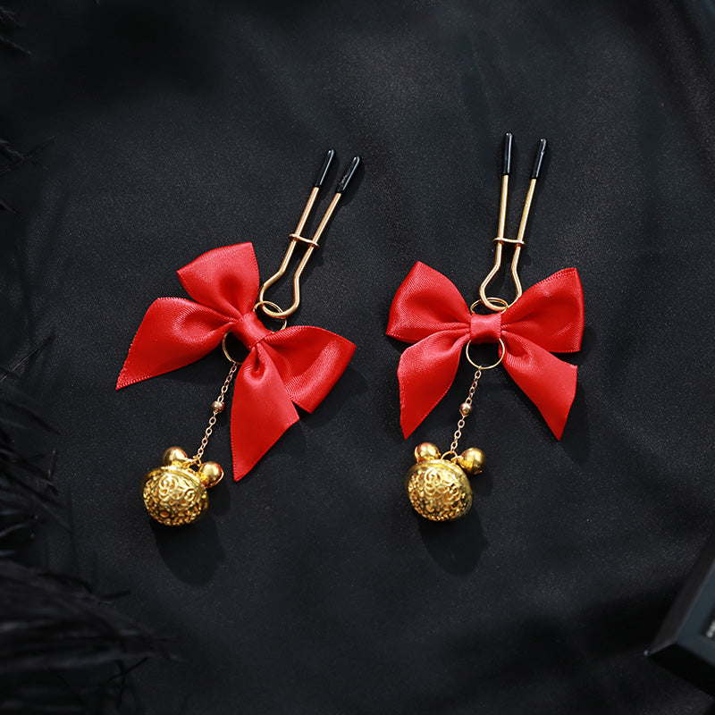 Model wearing red bell nipple clamps with adjustable pressure – Velalace