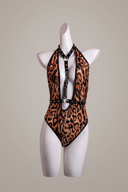 Leopard print open gear jumpsuit – product flatlay or mannequin view – Velalace